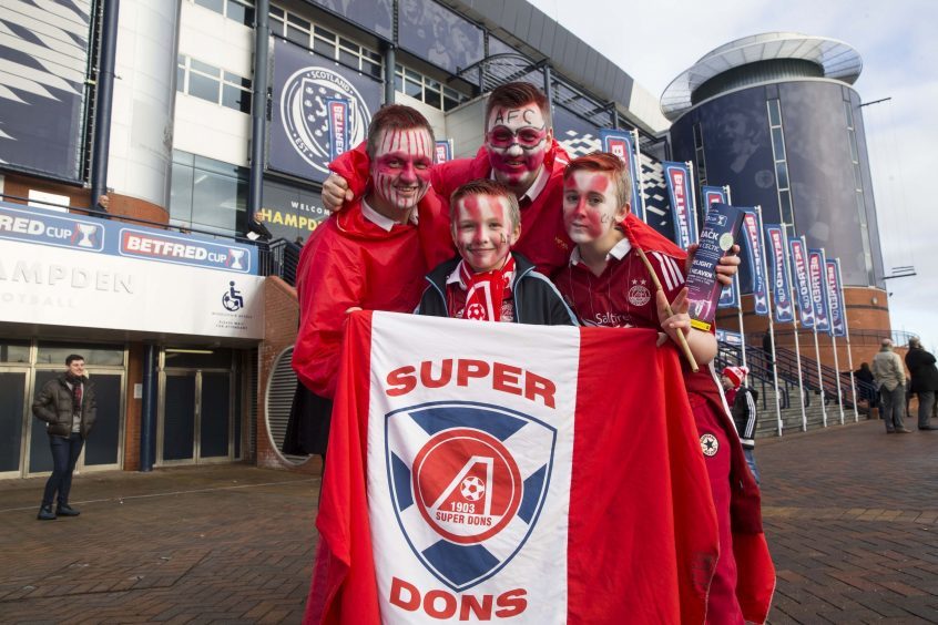 Aberdeen fans during the Scottish League Cup Final at Hampden Park, Glasgow. PRESS ASSOCIATION Photo. Picture date: Sunday November 27, 2016. See PA story SOCCER Final. Photo credit should read: Jeff Holmes/PA Wire. EDITORIAL USE ONLY