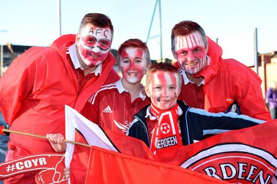 Betfred Cup final 2016 at Hampden Park.
Aberdeen v Celtic.

Picture of (L-R)David Paterson, Kyle Paterson, 12, Nathan Fothergill, 9, John Forthergill.

Picture by KENNY ELRICK     27/011/2016