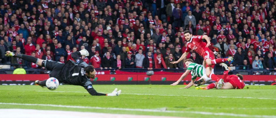 Celtic's James Forrest scores his side's second goal past Joe Lewis during the Scottish League Cup final in 2016.