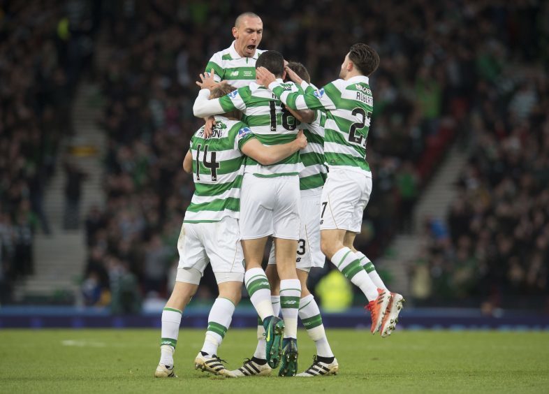 Celtic's Tom Rogic (18) celebrates having opened the scoring