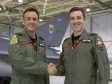 Wing Commander Mike Sutton (left) handing over command of 1 (Fighter) Squadron to Wing Commander Chris Hoyle (right) at RAF Lossiemouth.