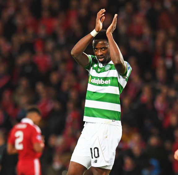 Celtic's Moussa Dembele celebrates after he scores his side's third goal after slotting home a penalty