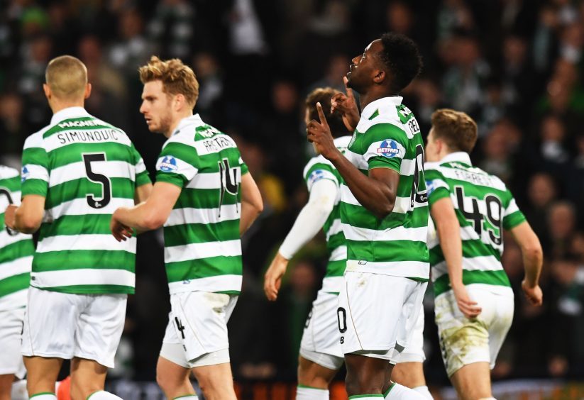 Celtic's Moussa Dembele celebrates after he scores his side's third goal after slotting home a penalty