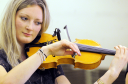 Mhairi Marwick teaches the fiddle to 26 children at her family's farm near Mosstodloch.