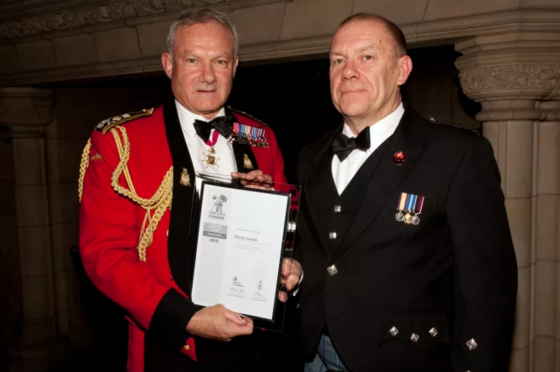 Vice-chief of Defence Staff, General Sir Gordon Messenger presenting Chris Tuke with the silver award.