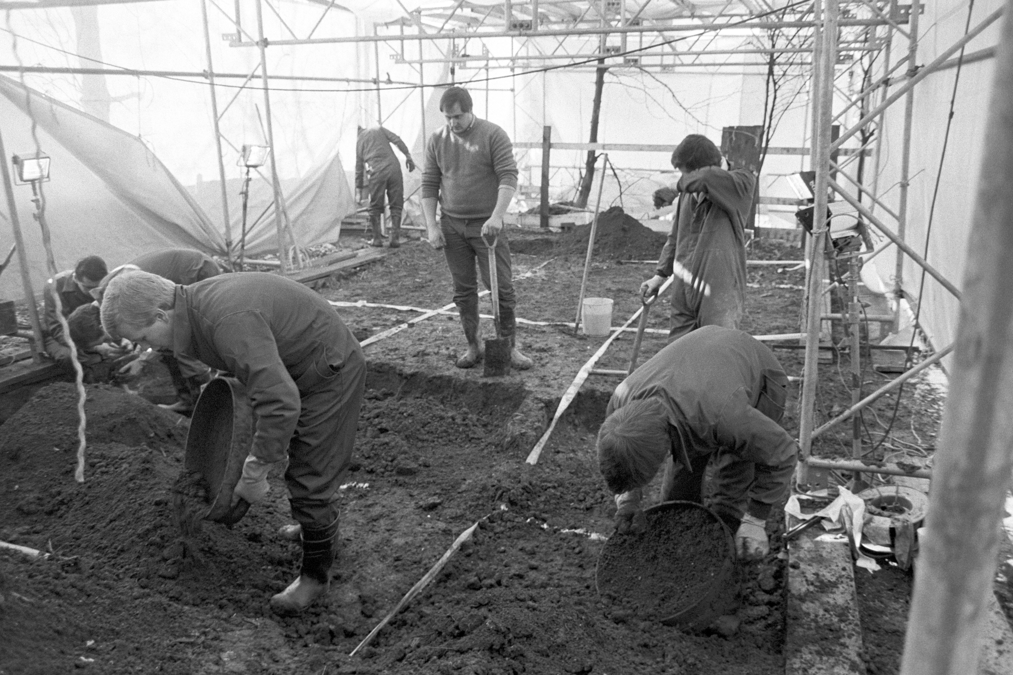 Police dig in the back garden of a house at Melrose Avenue, Willesden, north London.