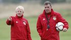 Mark McGhee, right, and Gordon Strachan look set to continue in their Scotland roles
