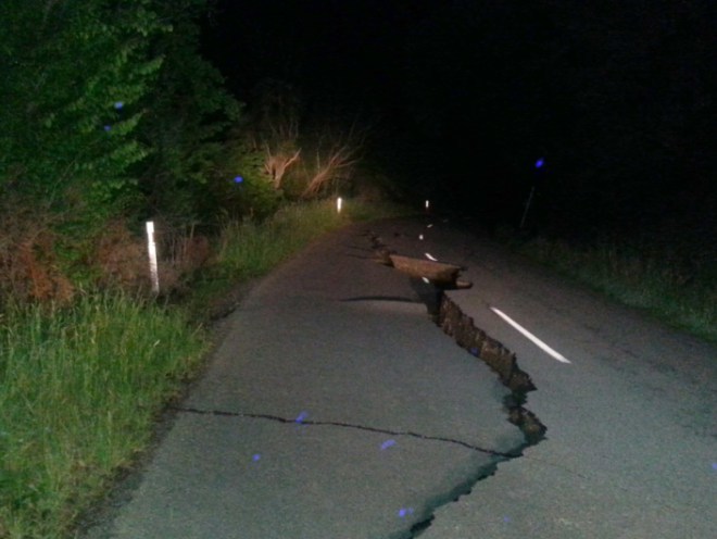 A large fissure runs along Kaikoura Road north of Christchurch (AP)