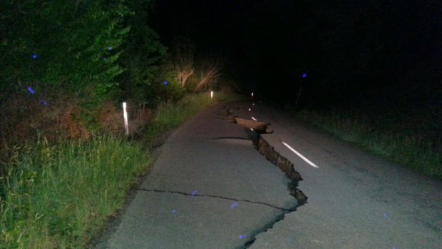 A large fissure runs along Kaikoura Road north of Christchurch  (AP)