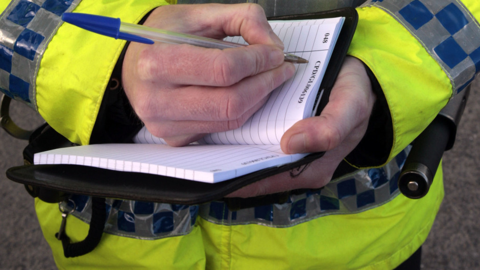 Police were confronted with a knife