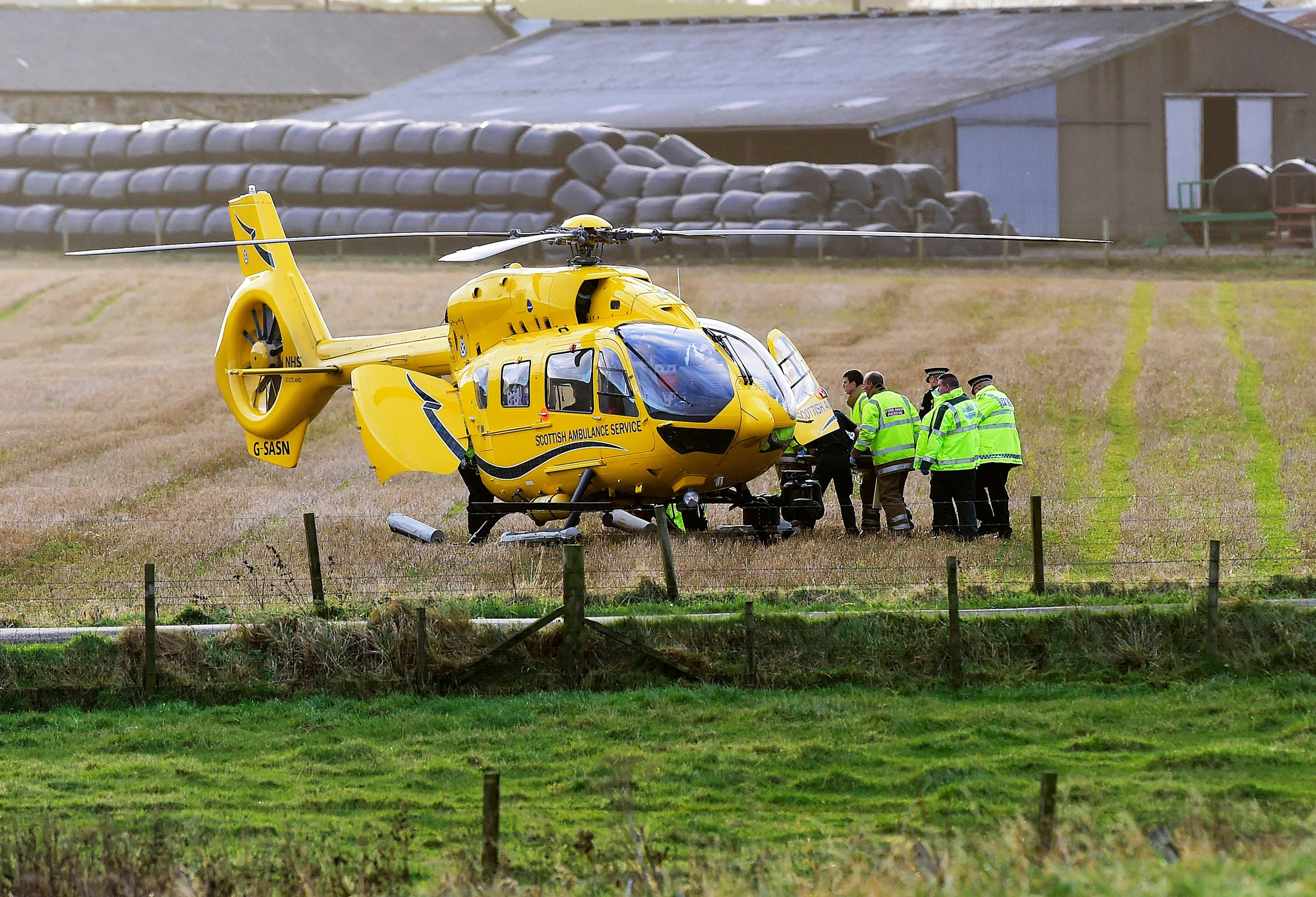 Air ambulance arrives to take one of the casualties to Aberdeen