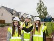Stewart Milne Homes trainee quantity surveyor Abbie Duthie (centre) shows pupils round a development