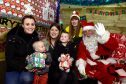 Keery Durno with Cloe Flett and Stephanie McHugh with Mia Durno, visited Santa at BA Stores