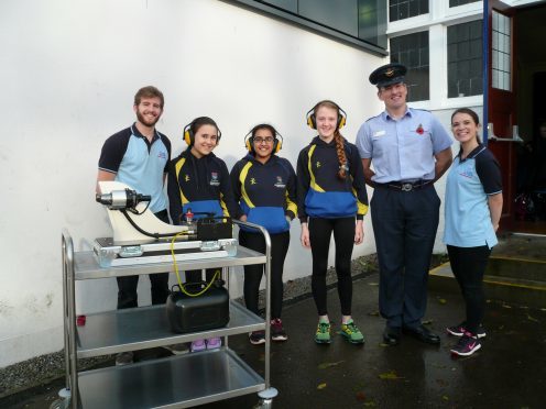 St Margaret's pupils Sara Yorston, Oishani Dutta and Bethany Riach welcome the RAF roadshow team.