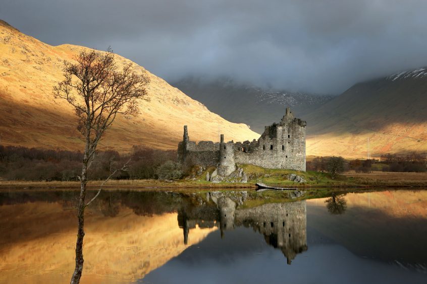 Sunrise at Kilchurn Castle, on the banks of Loch Awe, Argyll and Bute.