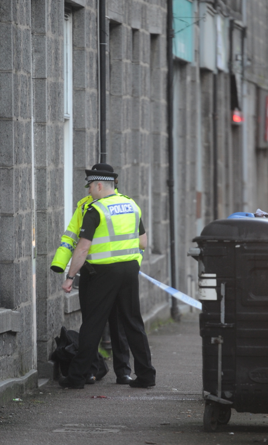 Police at the scene on Menzies Road, Torry