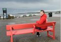 Emma Moore tries out the new Chas friendly bench.