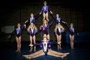 Members of the Forres Gymnastics Club pose during training at their gymnasium, after winning medals in their last competition
Picture by Gordon Lennox