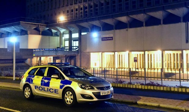 Police at the scene outside Aberdeen Uni's Zoology building