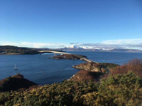 The view across the
Skye Bridge to the
snowy Cuillin
mountain range.