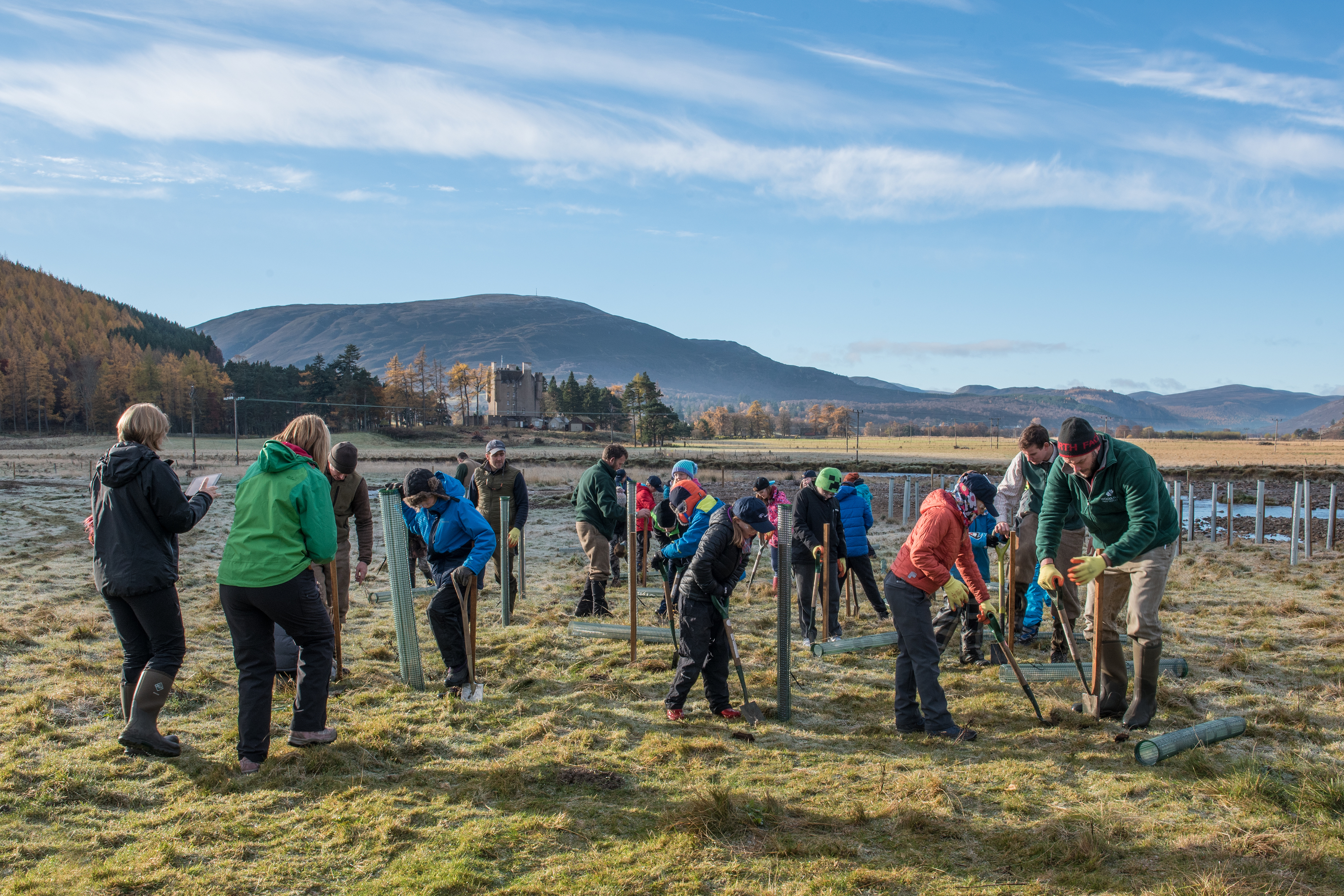 Pupils from Breamar Primary School helping plant trees on the banks of the River Dee