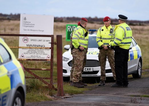 Police Scotland and Military Police at the gates to the range in Tain