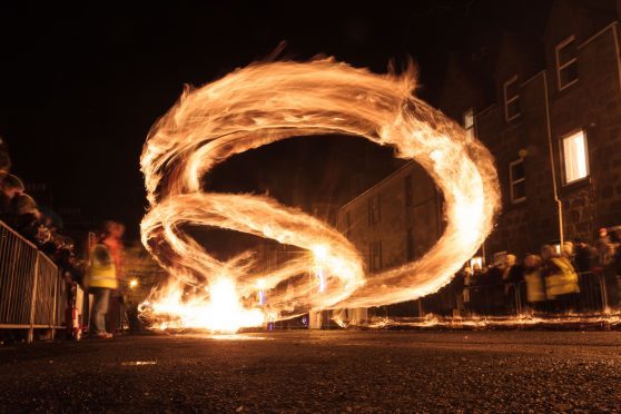 Stonehaven in Aberdeenshire brings in the New Year with the annual fireball celebrations.