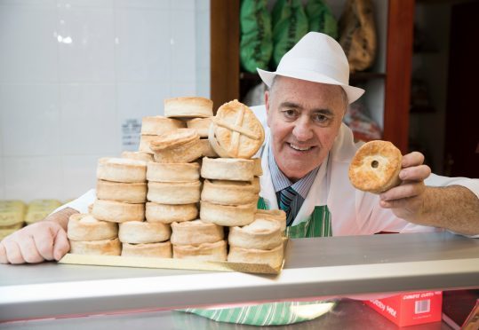 Alistair Bruce with his award winning pies.