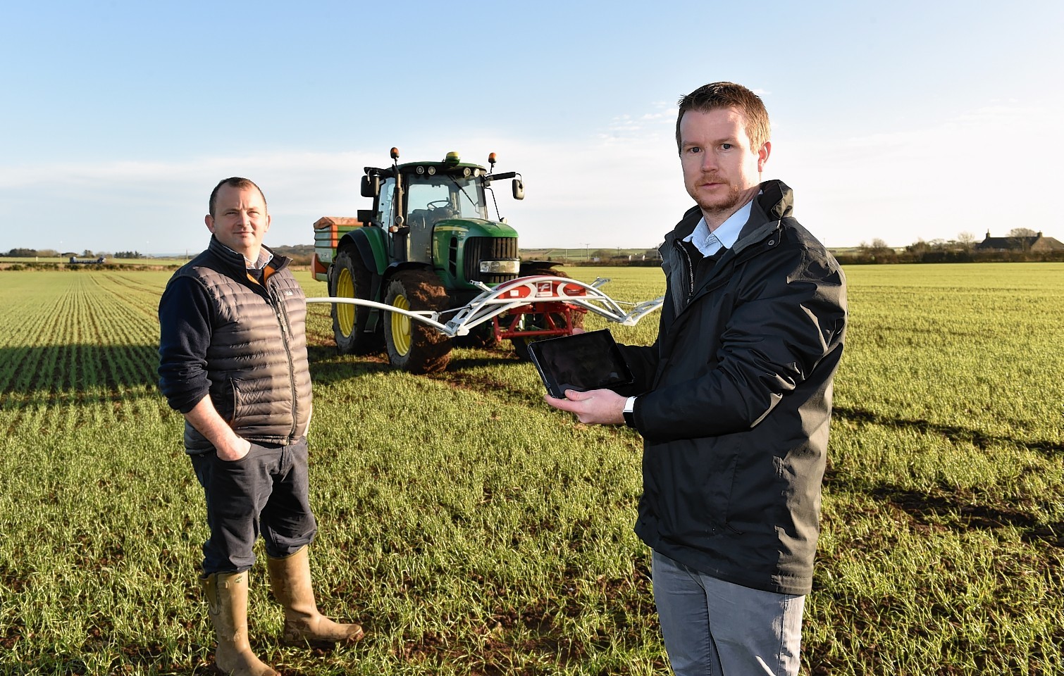 Lewis McKerrow (right) on Andrew Booth's Savock Farm near Foveran where precision farming tools are regularly used