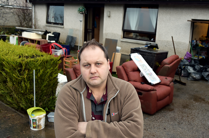 Stuart Moffat, of Canal Crescent Port Elphinstone, at his home shortly after the flood