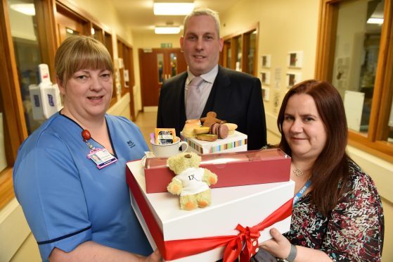 Picture of (L-R) Nicole Bauwens (Neonatal Unit), Graham Wood (Chester Hotel) and Annie Roberts.

Picture by Kenny Elrick.