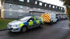 Police at the scene at Johnston Gardens, Culter, yesterday