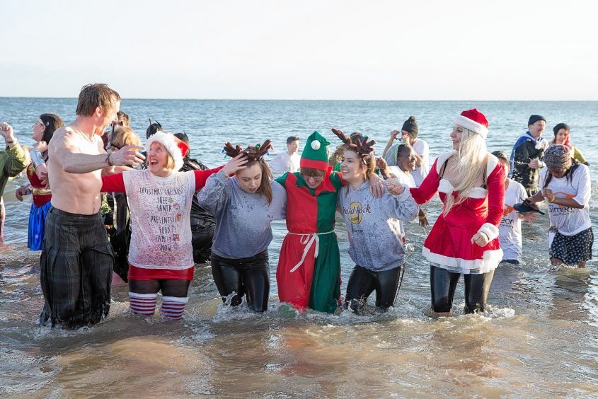 Aberdeen Lions Club Charity traditional Boxing Day Dip in The North Sea At Aberdeen Beach
