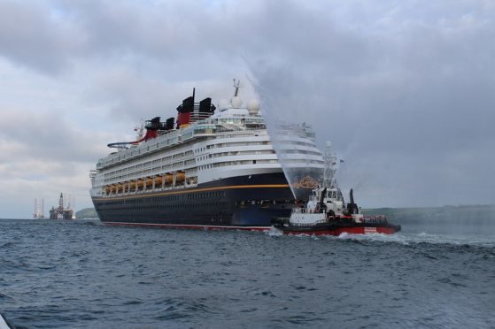 The Disney Magic cruise liner arriving in Invergordon in 2016.