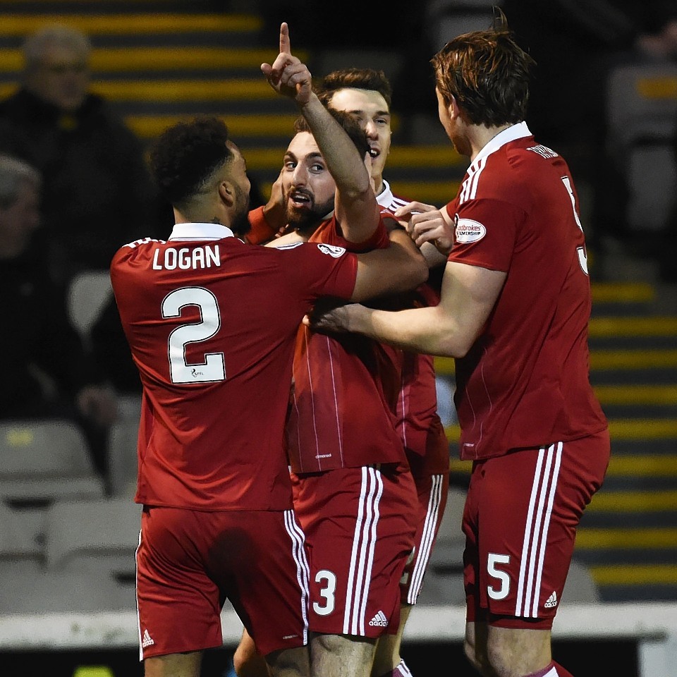 Aberdeen's Graeme Shinnie (L) celebrates with teammate Shay Logan (2) after scoring his side's first goal