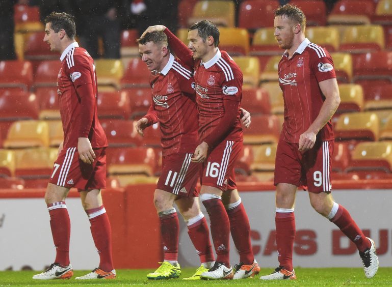 Aberdeen's Jonny Hayes celebrates after scoring the third