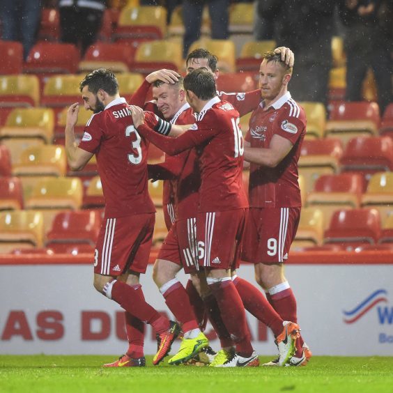 Aberdeen's Jonny celebrates his goal with his team mates