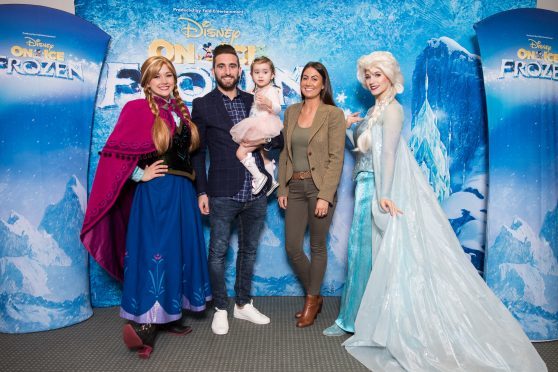 Graeme Shinnie with his partner and daughter