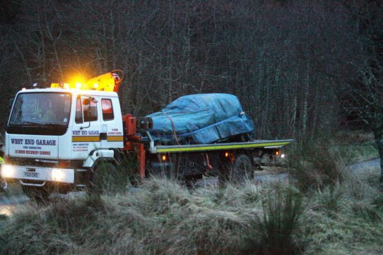 The car being taken away after the crash