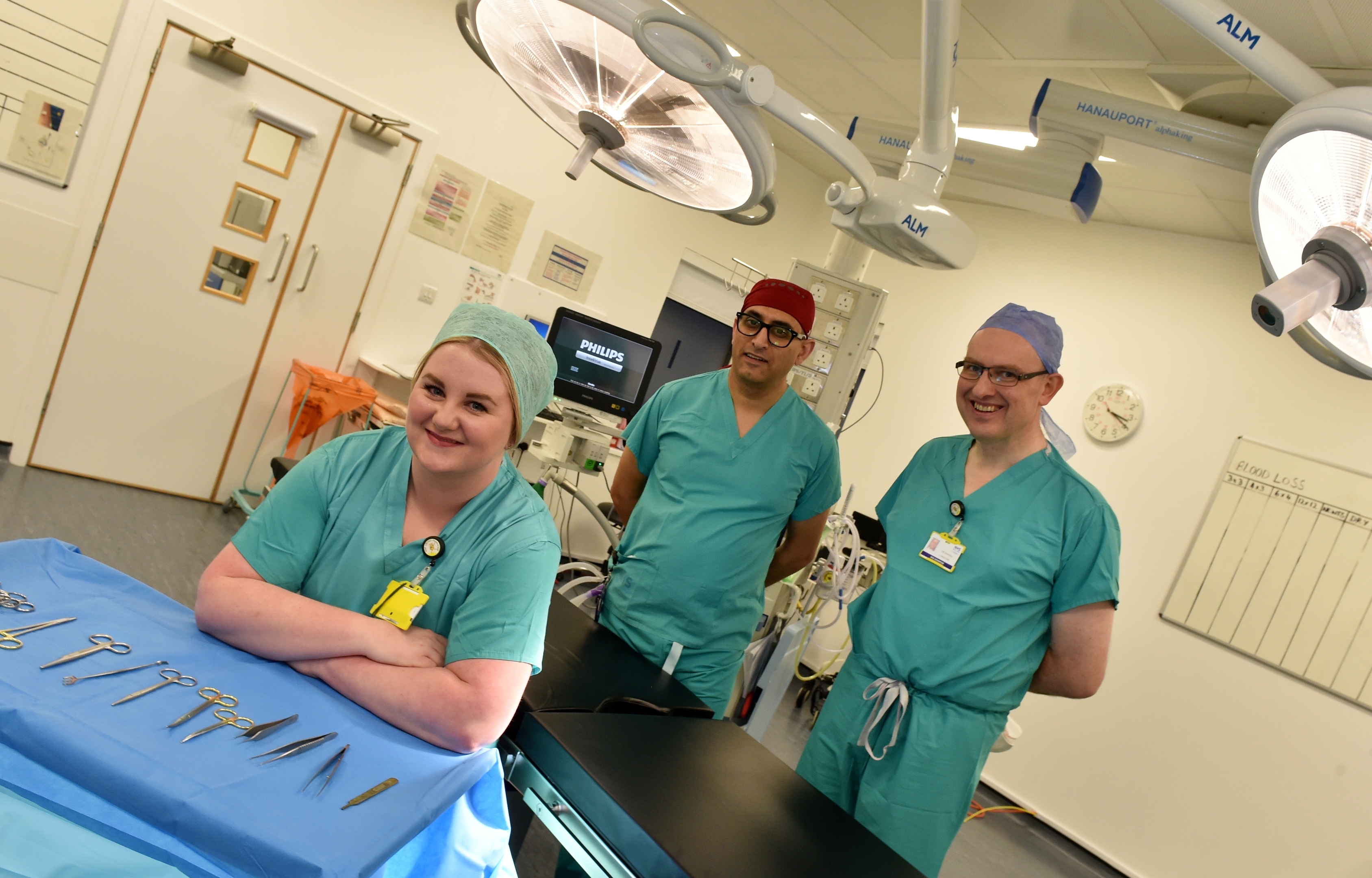 ARCHIE funding has helped Katie Anderson become the first ever Paediatric Theatre Staff Nurse in Scotland, She is pictured with Mr Yatin Patel, Paediatric General Surgeon (left) and Mr Tim Dughall, Paediatric Orthopaedic Surgeon.
Picture by Colin Rennie.
