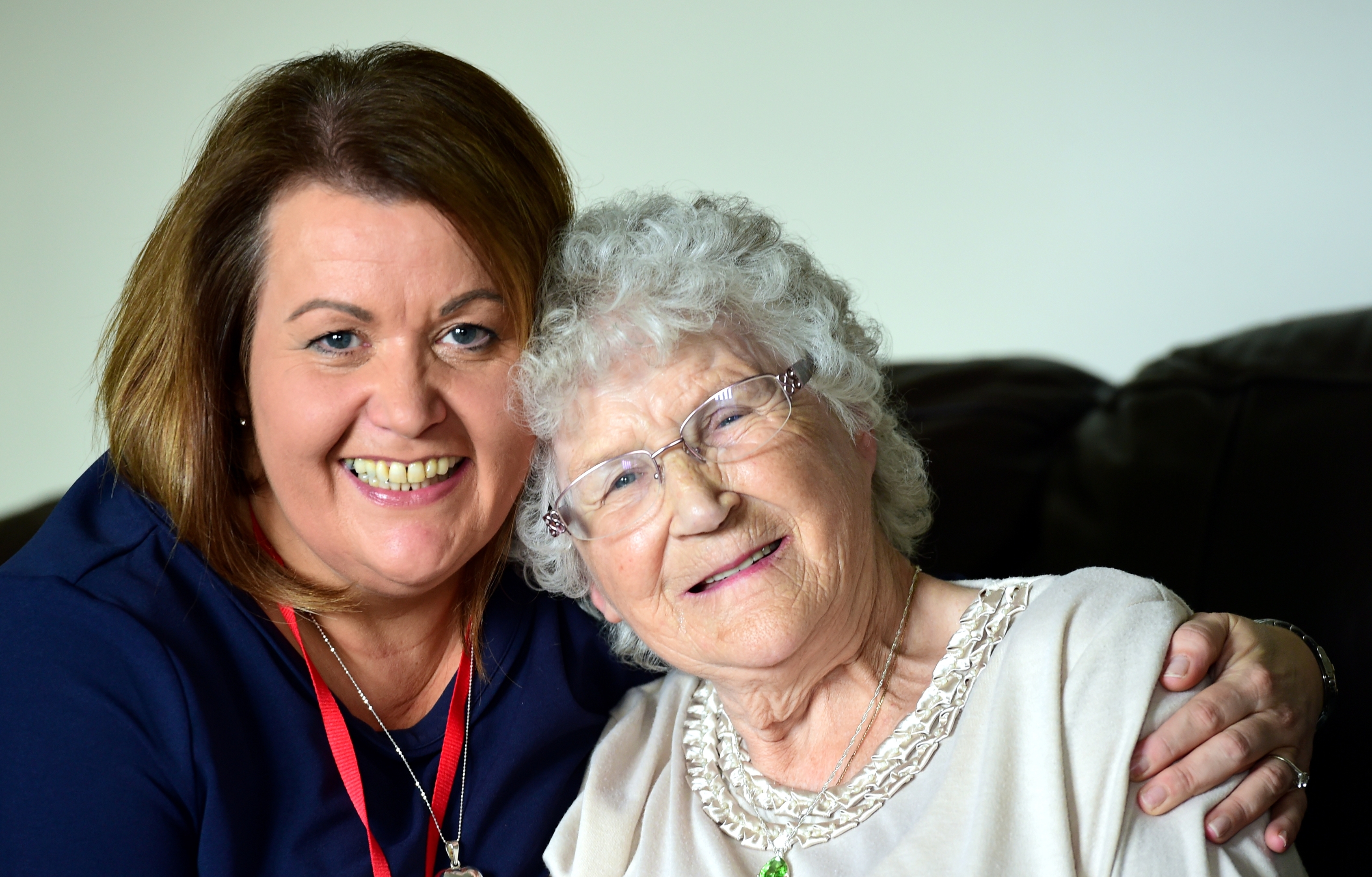 Oil worker Laura Duncan (left) who volunteers for charity TLC who pair up people with the elderly for companionship, she is pictured with her now friend Irene Anderson, who happens to have rescues Laura from a fire 20 years ago. .....see story Kieran Beattie. Picture by Kami Thomson 30-07-16