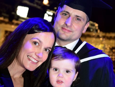 Michael O'Donnell of Elgin with Nicole Kennedy and daughter Mila.