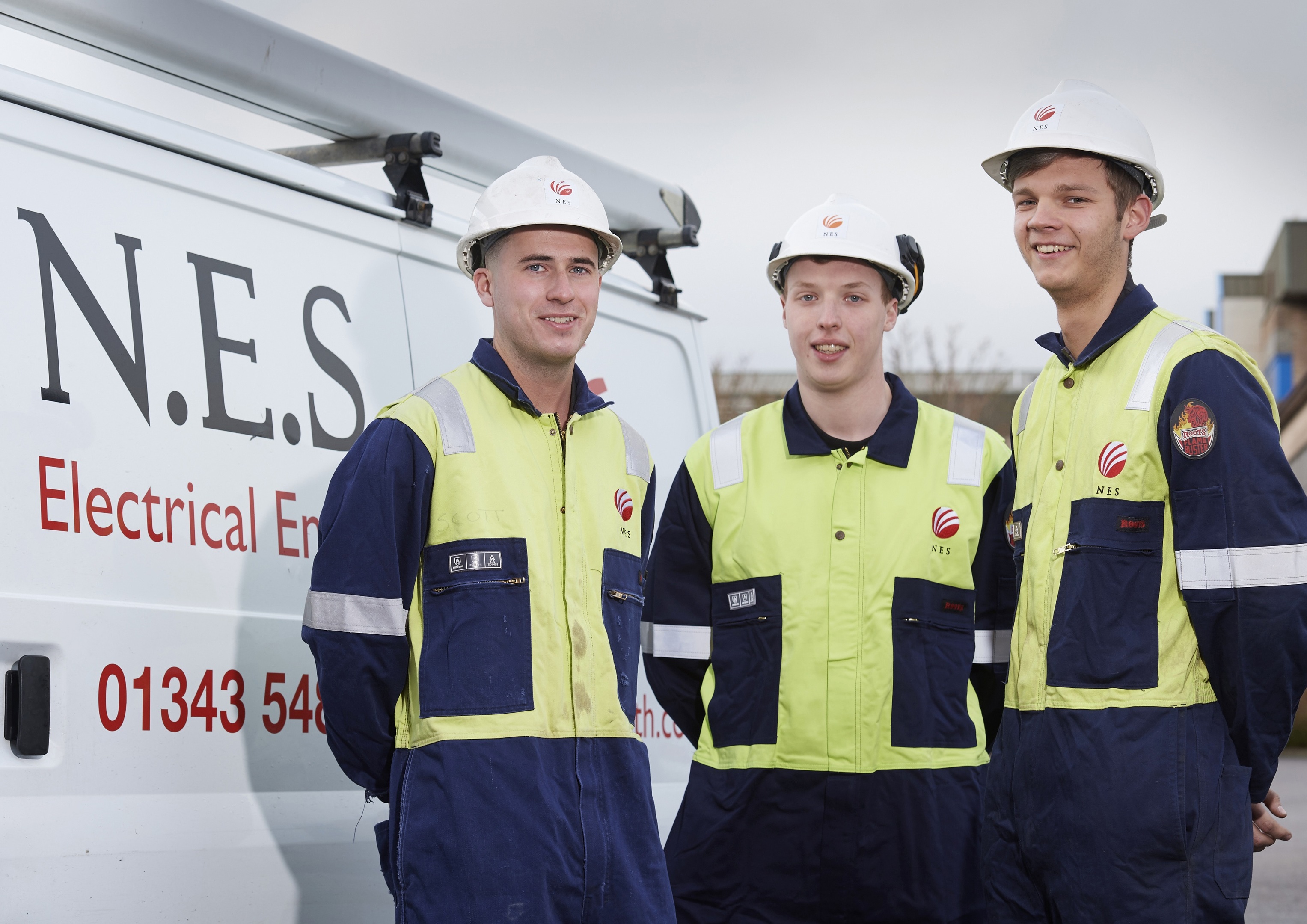 NES electrician Scott Mathieson with apprentices Lewis Bates and Craig Mone.