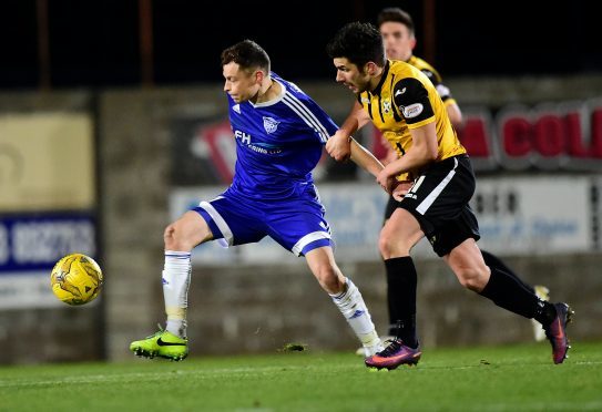 Peterhead's Nicky Riley in action