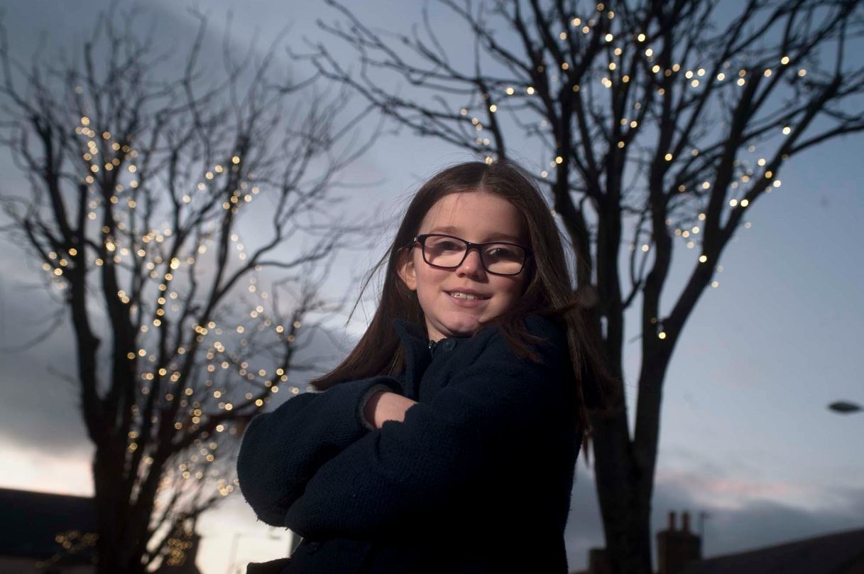 Seven-year-old Lanthe Mitchell was chosen to switch on the first-ever Christmas lights in Portgordon.
