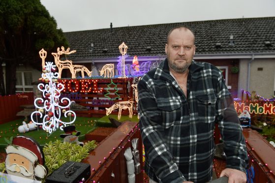 Robert Russell of Oldtown Road, Inverness has had his garden Santas Grotto shut down by Highland Council.