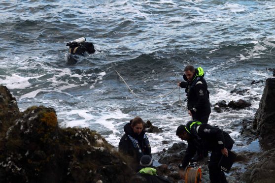 Members of Oban Mountain Rescue Team and Divers from Police Scotland search nr Dunollie Point Oban for missing 52 year old woman Crystalla Dean picture kevin mcglynn