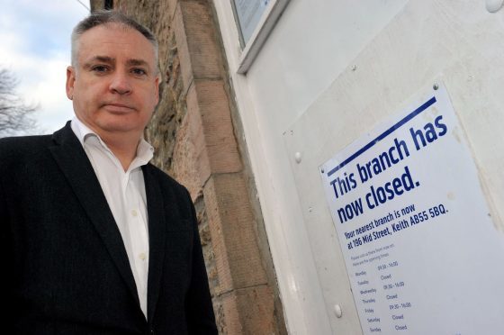 MSP Richard Lochhead beiside the closed branch of the Bank Of Scotland in Aberlour. Picture by Gordon Lennox.