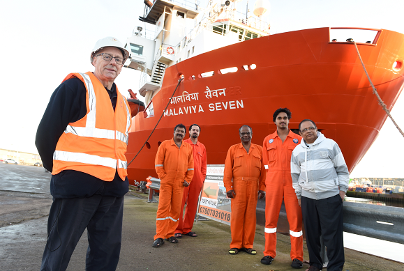 (from left) Doug Duncan, the Aberdeen port chaplain for Catholic charity Apostleship of the Sea, with Malaviya Seven crew members Clay Vaz, Ashish Prabhakar, Bamadev Swain, Rahul Sharma and captain L.B. Singh. AoS has been supporting the crew of the MV Malaviya Seven throughout the Christmas period.