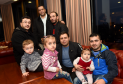Members of the Aberdeen Syrian refugee community, and translator Bahaa Mahmoud, rear
